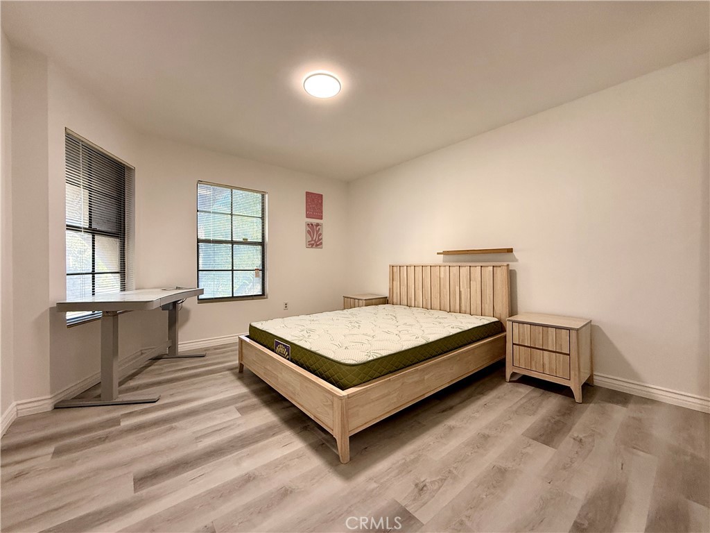 1415 Everton Place Riverside, CA 92507 - Photo 21 of 24 a bedroom with a bed and window