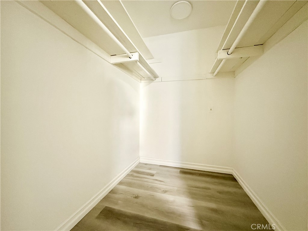 1415 Everton Place Riverside, CA 92507 - Photo 23 of 24 a view of a room with racks on the wall