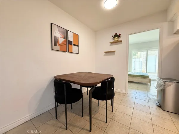 a view of a livingroom with furniture and front door