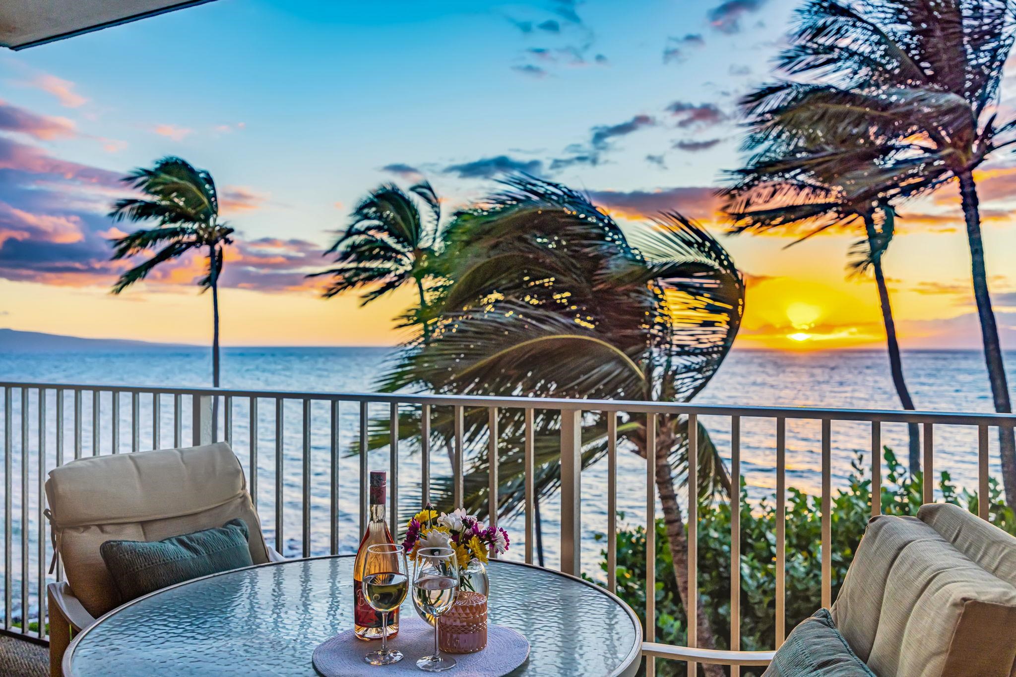 a view of balcony with furniture and potted plant