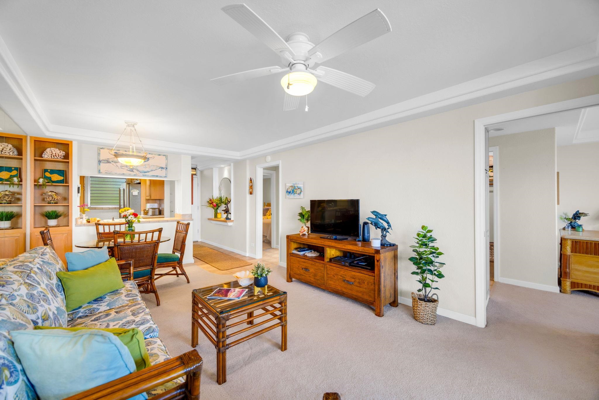 2430 South Kihei Road, Unit 515 Kihei, HI 96753 - Photo 11 of 50 a living room with furniture and a flat screen tv