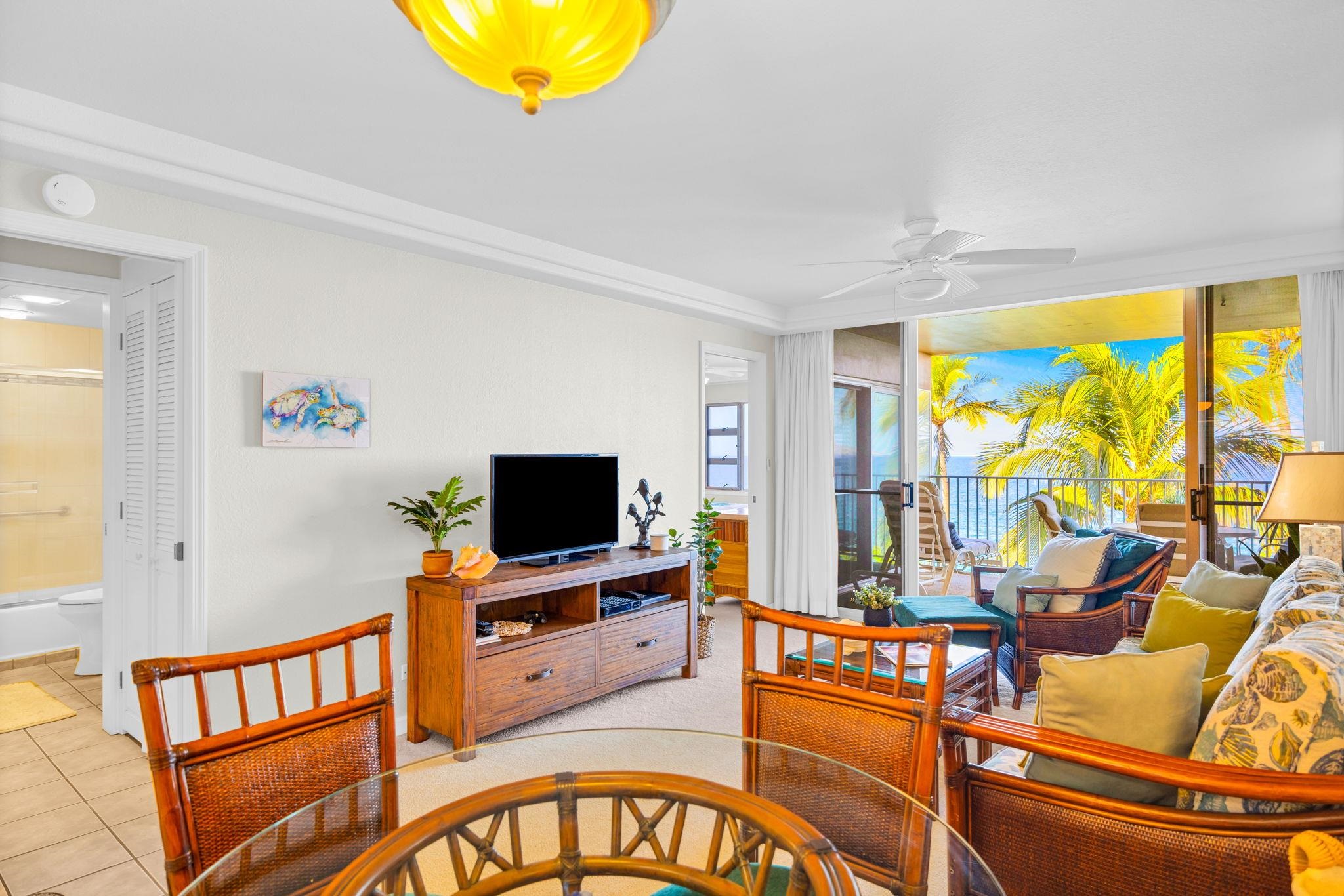 2430 South Kihei Road, Unit 515 Kihei, HI 96753 - Photo 13 of 50 a living room with furniture and a flat screen tv