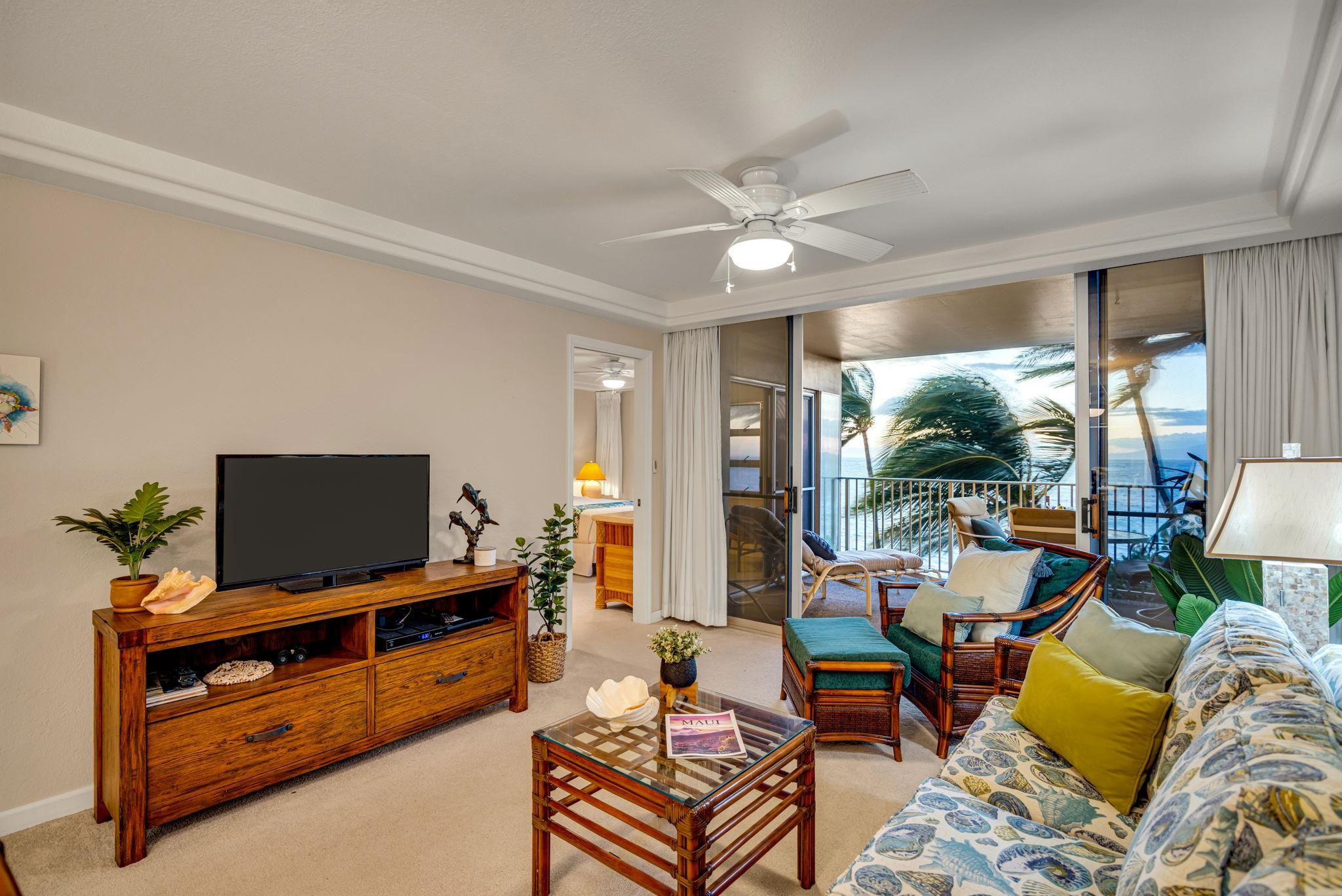 2430 South Kihei Road, Unit 515 Kihei, HI 96753 - Photo 15 of 50 a living room with furniture and a flat screen tv