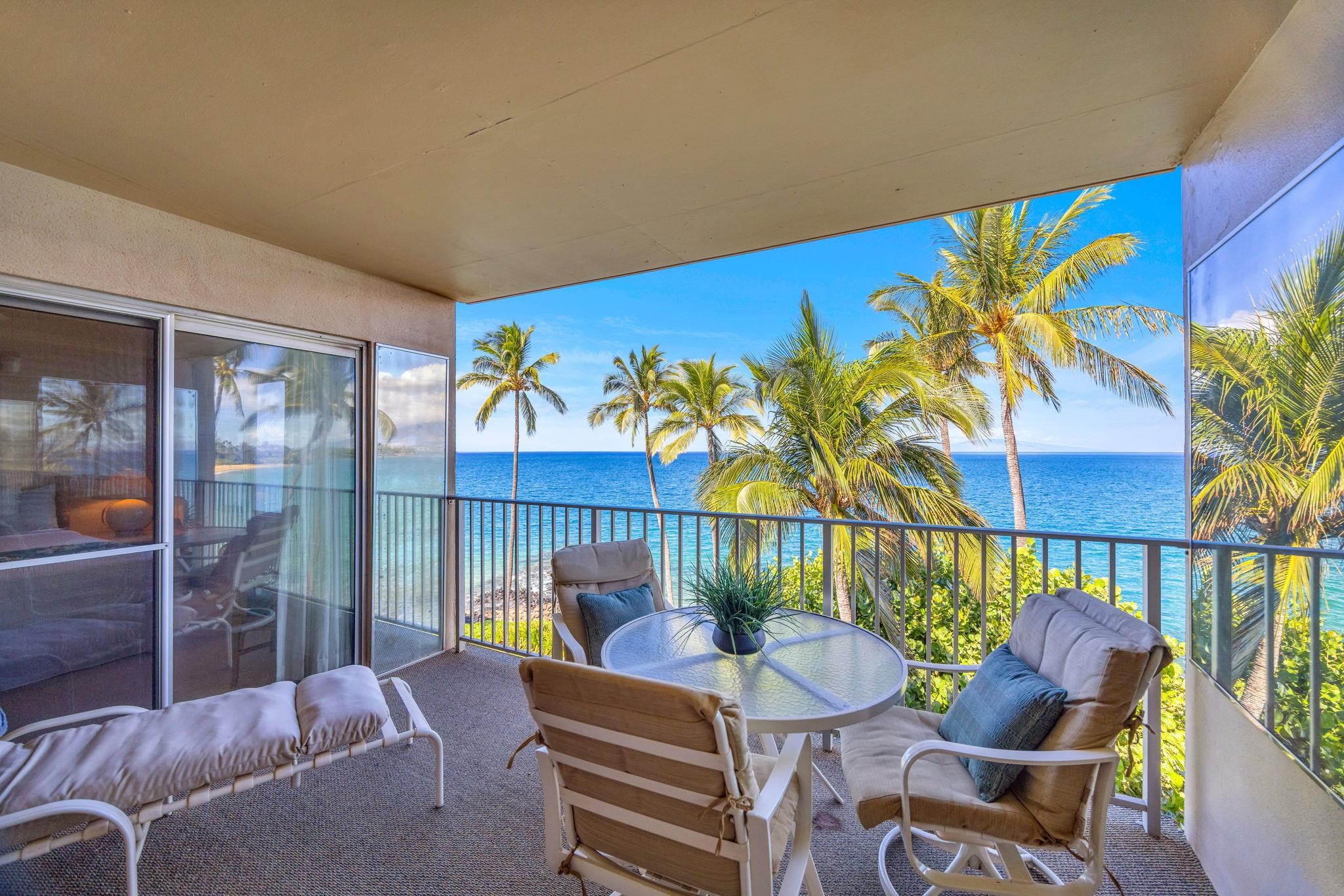 2430 South Kihei Road, Unit 515 Kihei, HI 96753 - Photo 21 of 50 a view of a chairs and table in patio