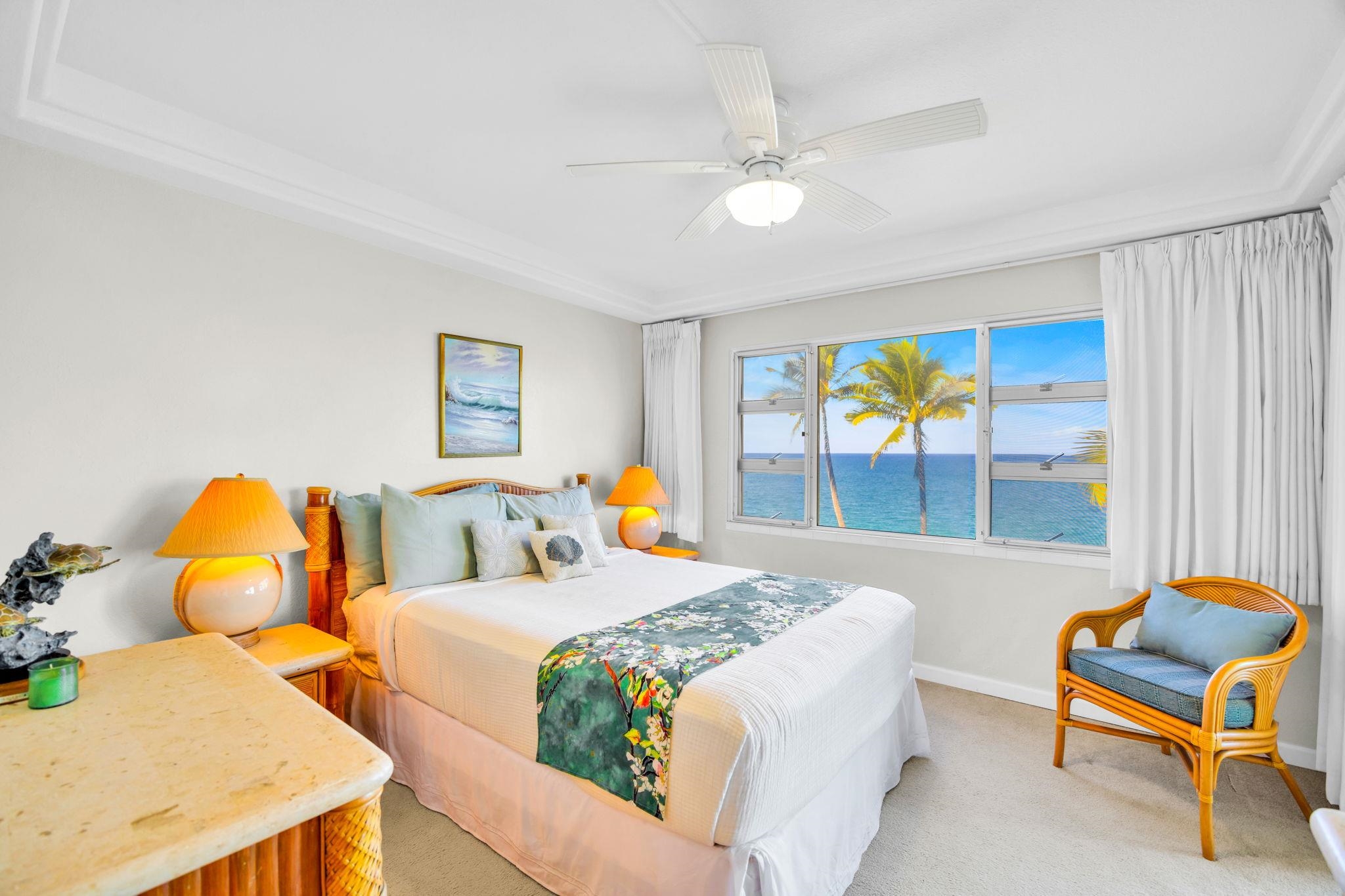 2430 South Kihei Road, Unit 515 Kihei, HI 96753 - Photo 22 of 50 a bedroom with two beds and a large window