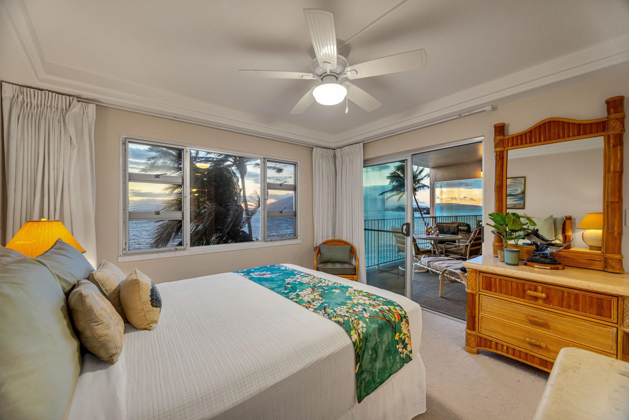 2430 South Kihei Road, Unit 515 Kihei, HI 96753 - Photo 24 of 50 a bedroom with a bed and large windows