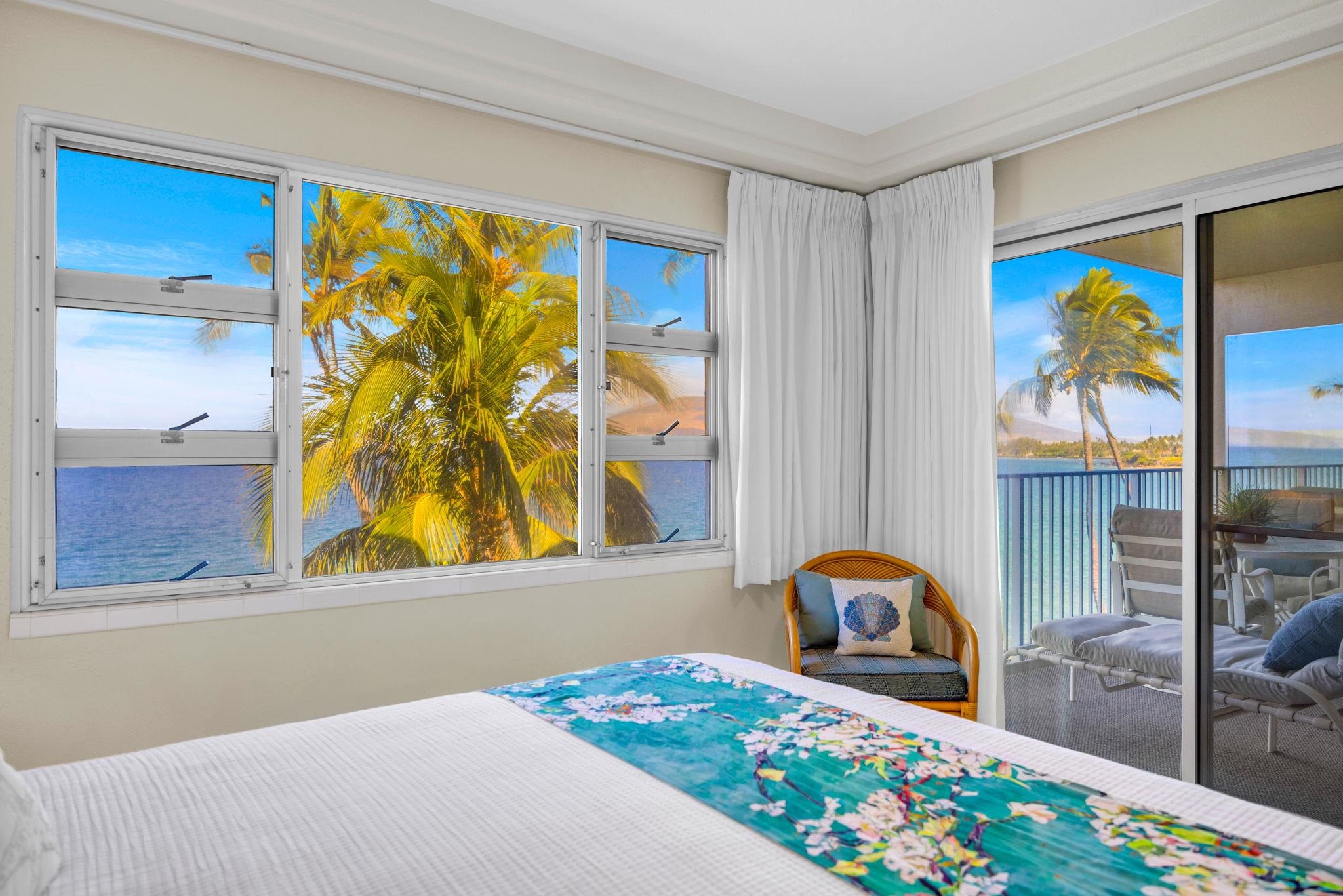 2430 South Kihei Road, Unit 515 Kihei, HI 96753 - Photo 25 of 50 a bedroom with a bed and a painting on the wall