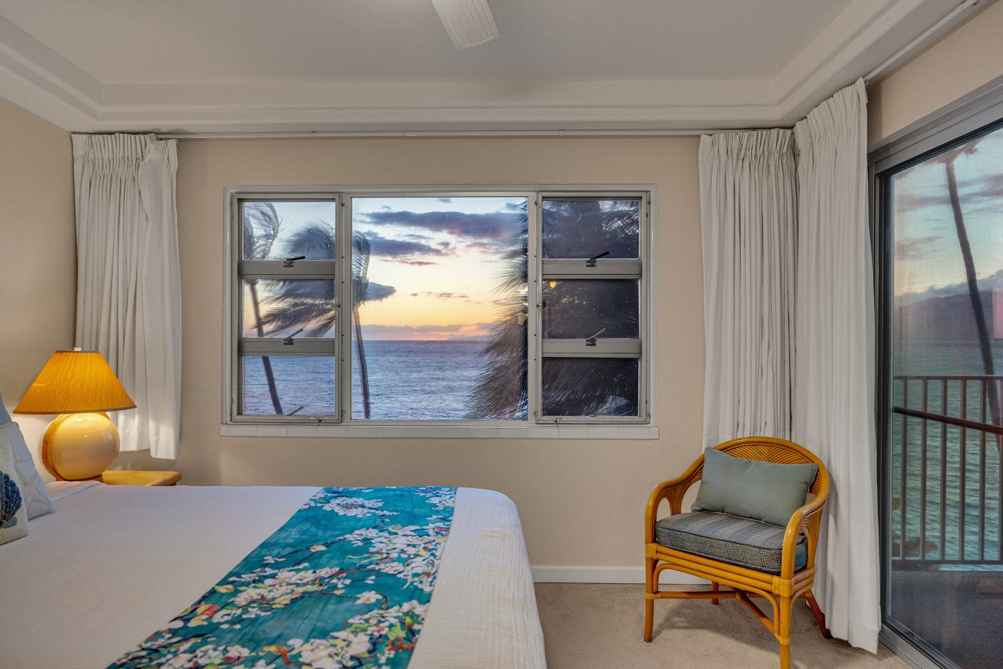 2430 South Kihei Road, Unit 515 Kihei, HI 96753 - Photo 26 of 50 a bedroom with a bed and wooden floor
