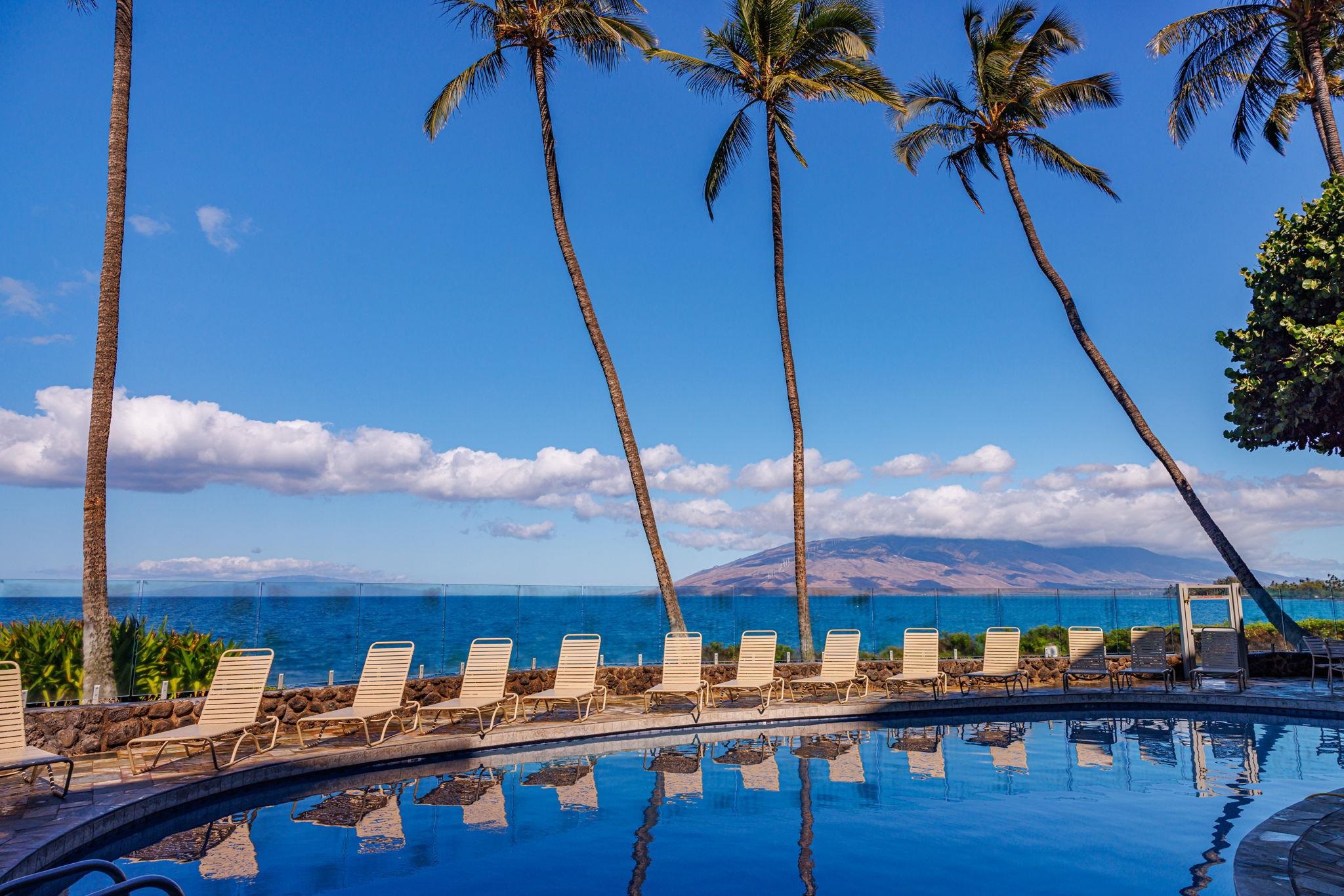 2430 South Kihei Road, Unit 515 Kihei, HI 96753 - Photo 3 of 50 a view of a chairs and table on the terrace