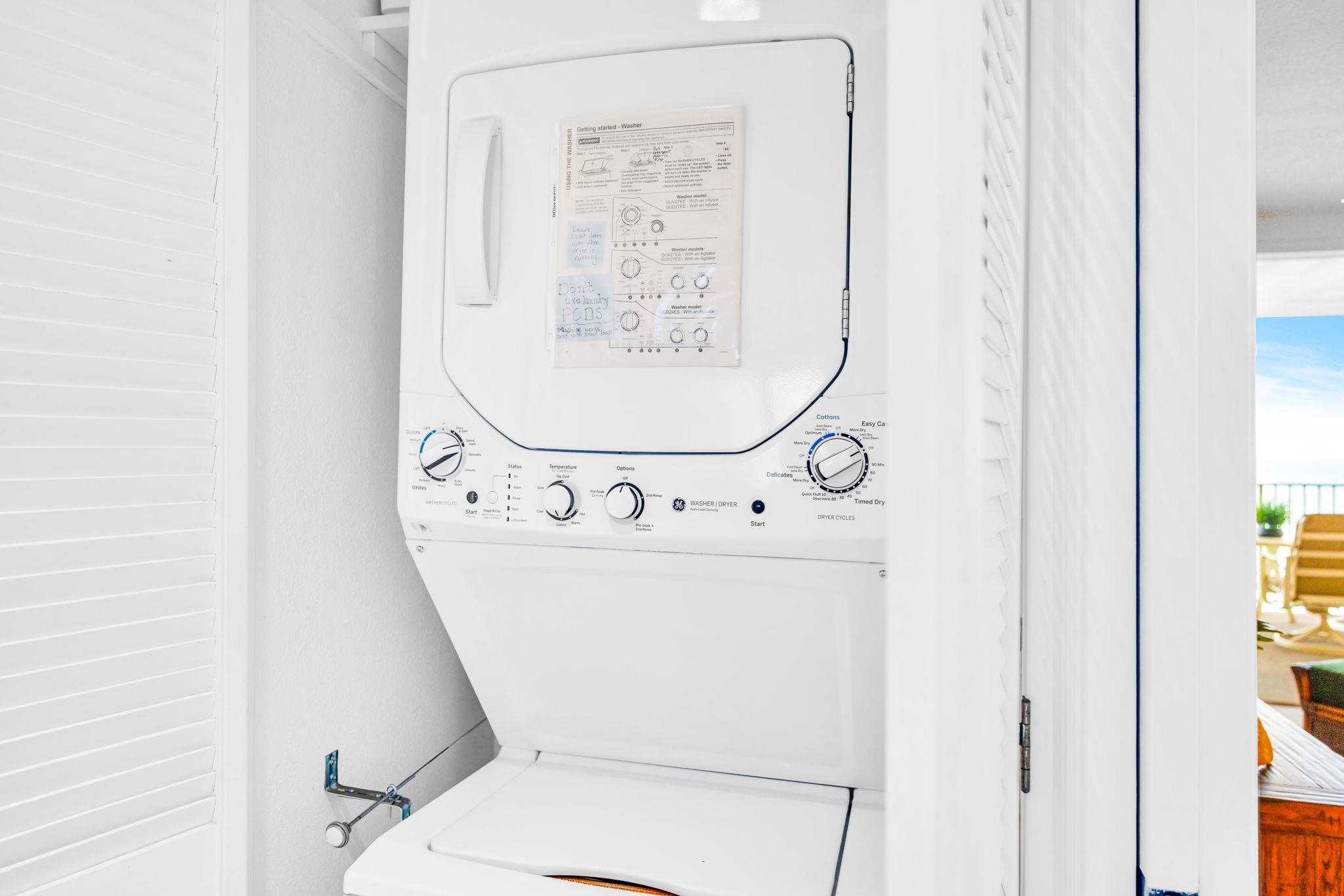 2430 South Kihei Road, Unit 515 Kihei, HI 96753 - Photo 35 of 50 a close view of a utility room with dryer and washer