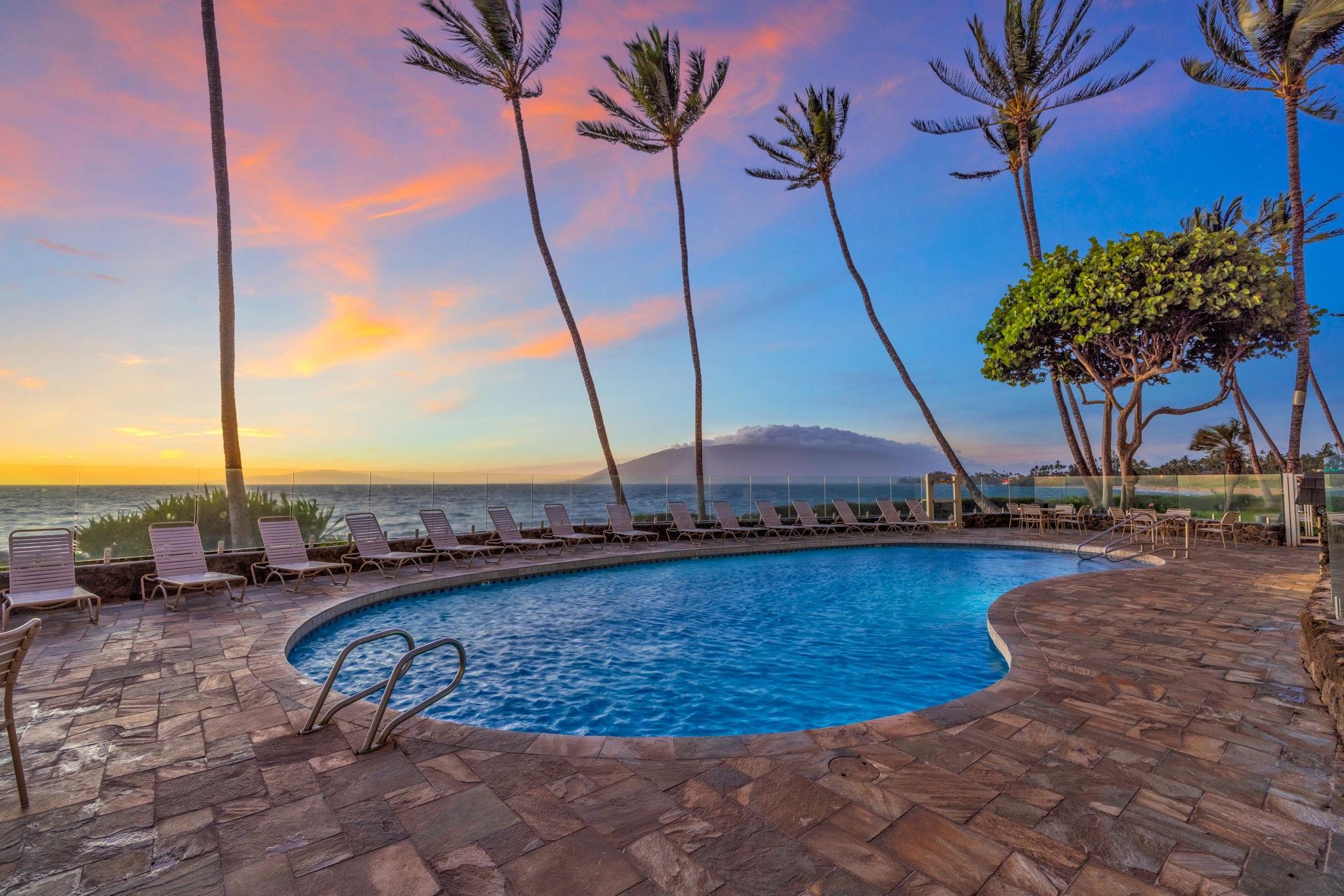 2430 South Kihei Road, Unit 515 Kihei, HI 96753 - Photo 50 of 50 a view of a swimming pool with a lounge chairs
