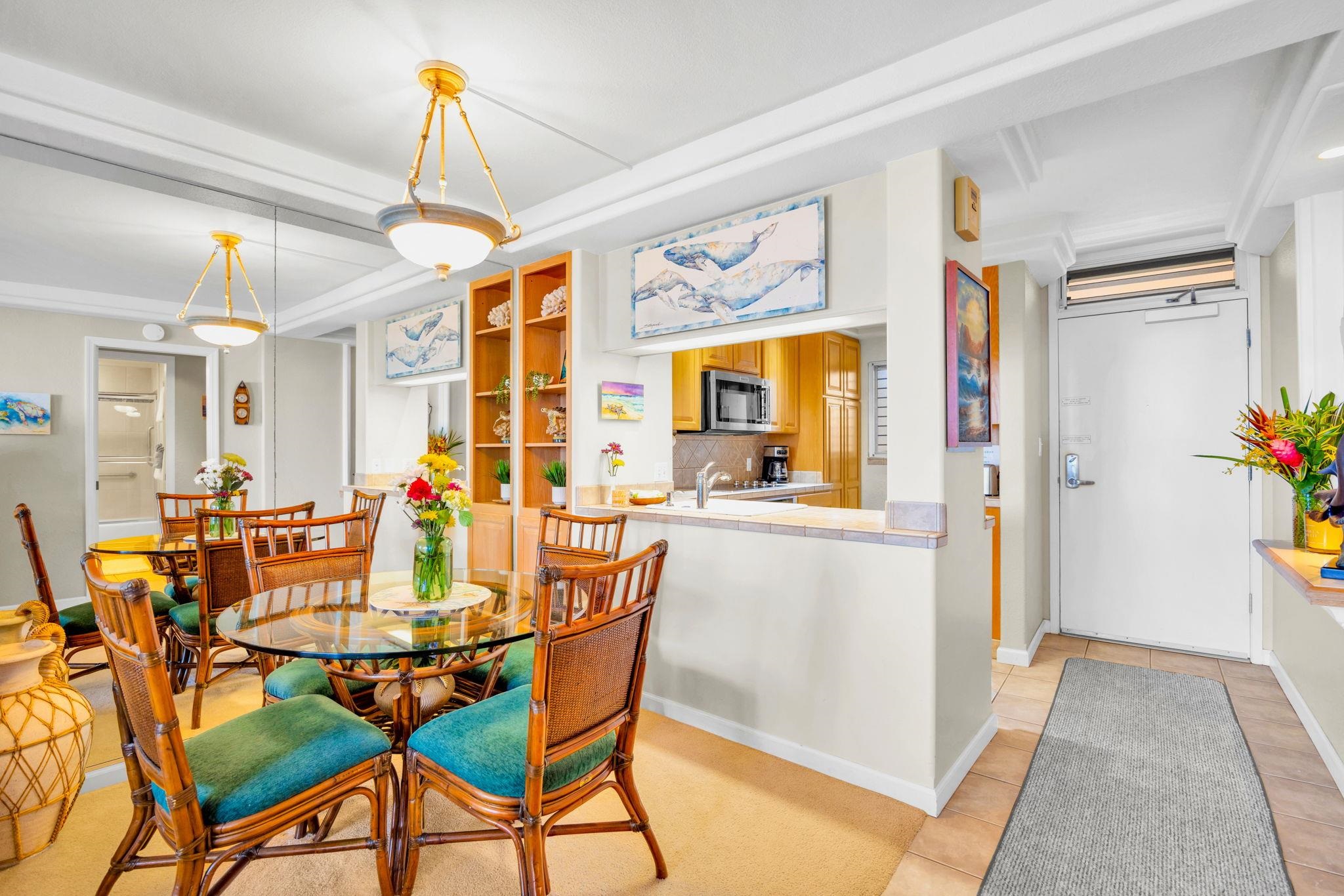 2430 South Kihei Road, Unit 515 Kihei, HI 96753 - Photo 9 of 50 a dining room with furniture and window