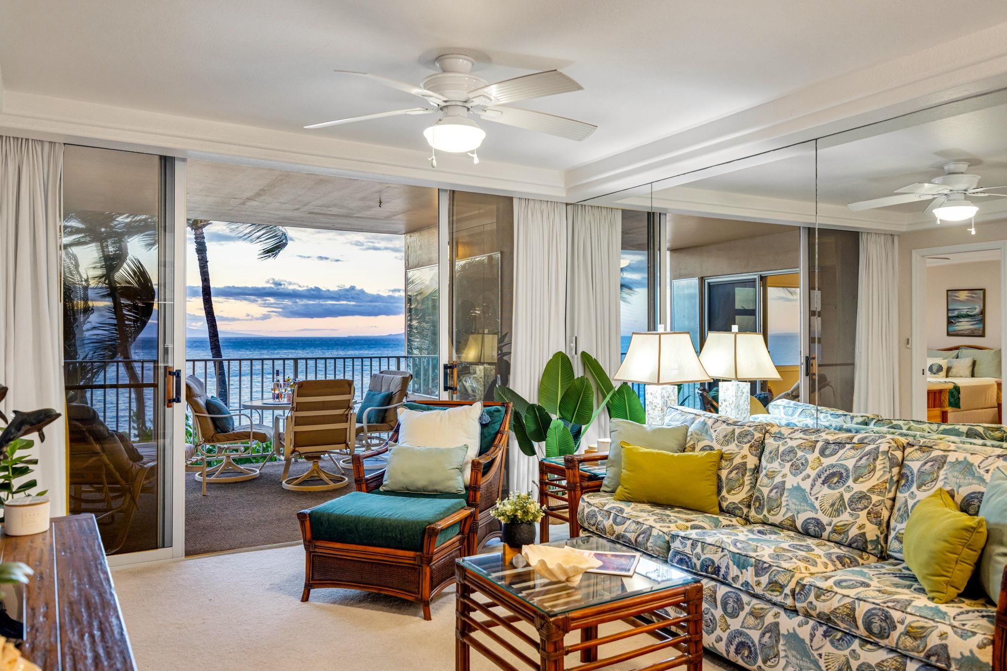 2430 South Kihei Road, Unit 515 Kihei, HI 96753 - Photo 10 of 50 a living room with furniture and a large window