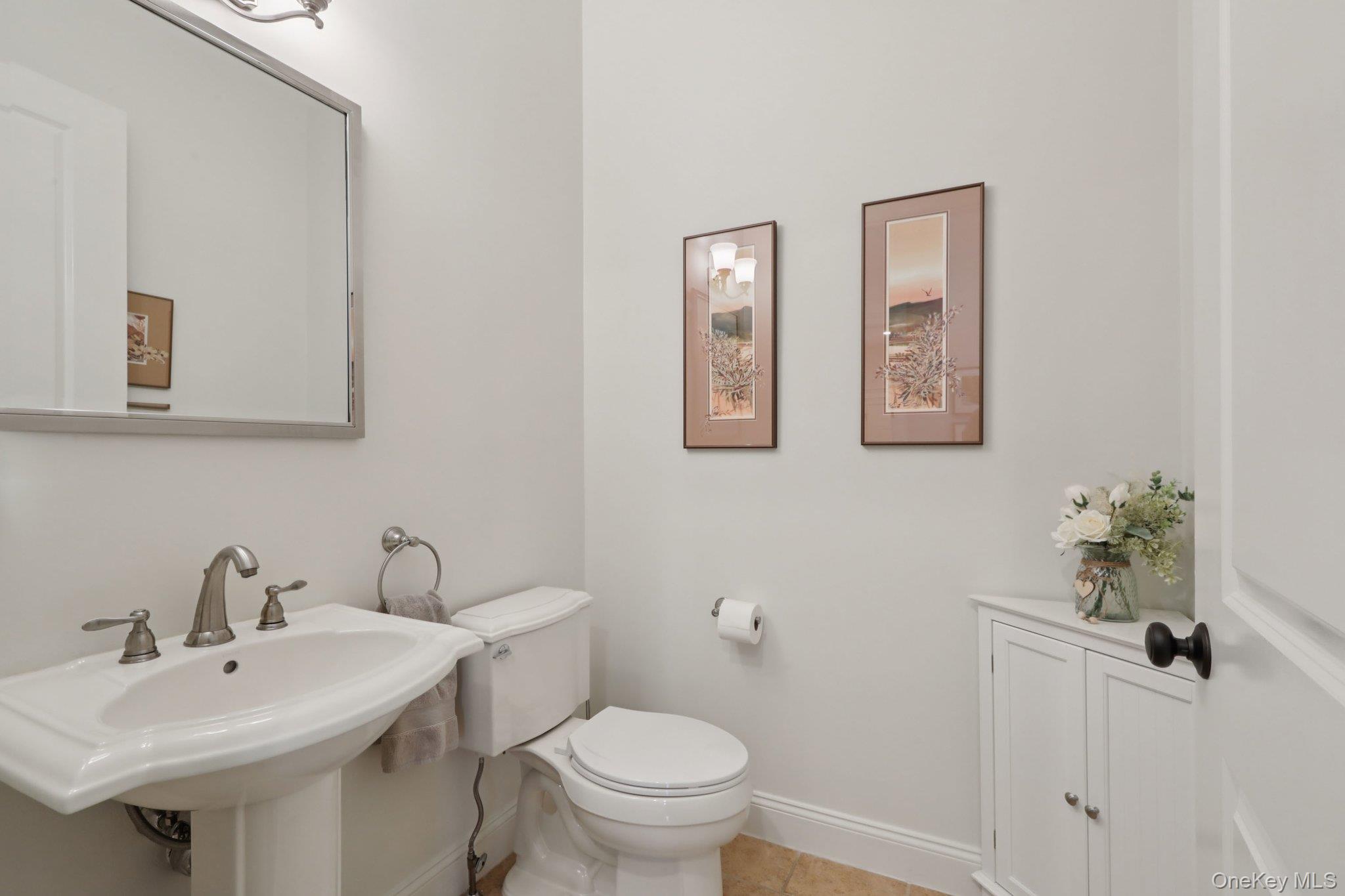 21 Long House Road Warwick, NY 10990 - Photo 22 of 50 a bathroom with a toilet sink and mirror