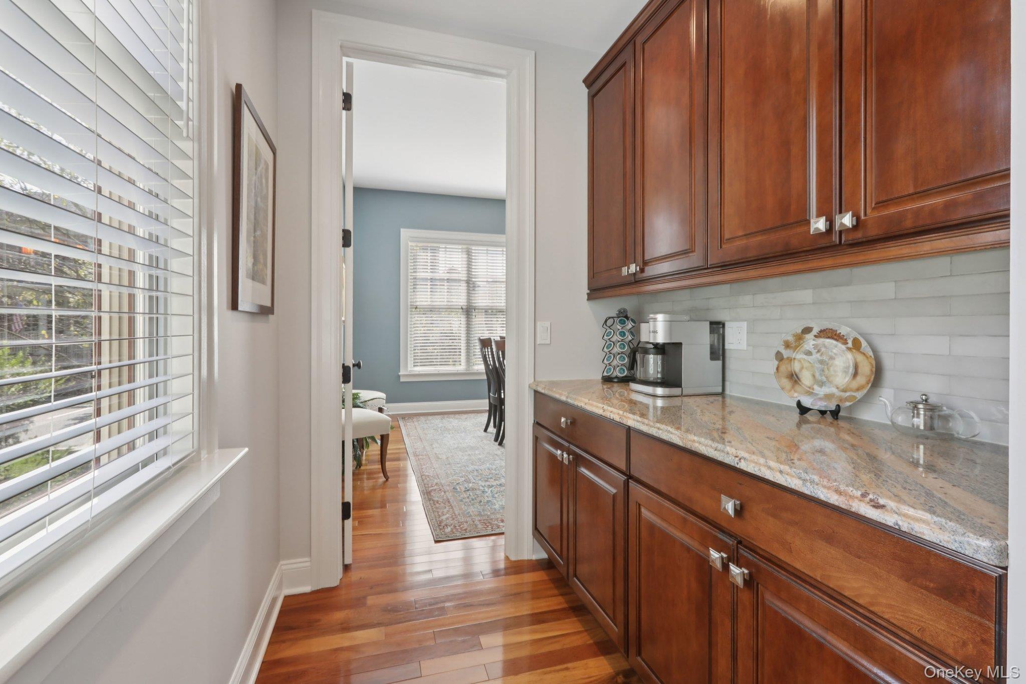 21 Long House Road Warwick, NY 10990 - Photo 23 of 50 a kitchen with granite countertop wooden cabinets a sink and dishwasher