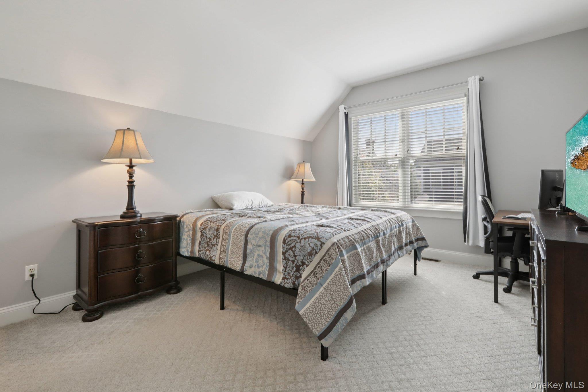 21 Long House Road Warwick, NY 10990 - Photo 30 of 50 a bedroom with a bed and a table