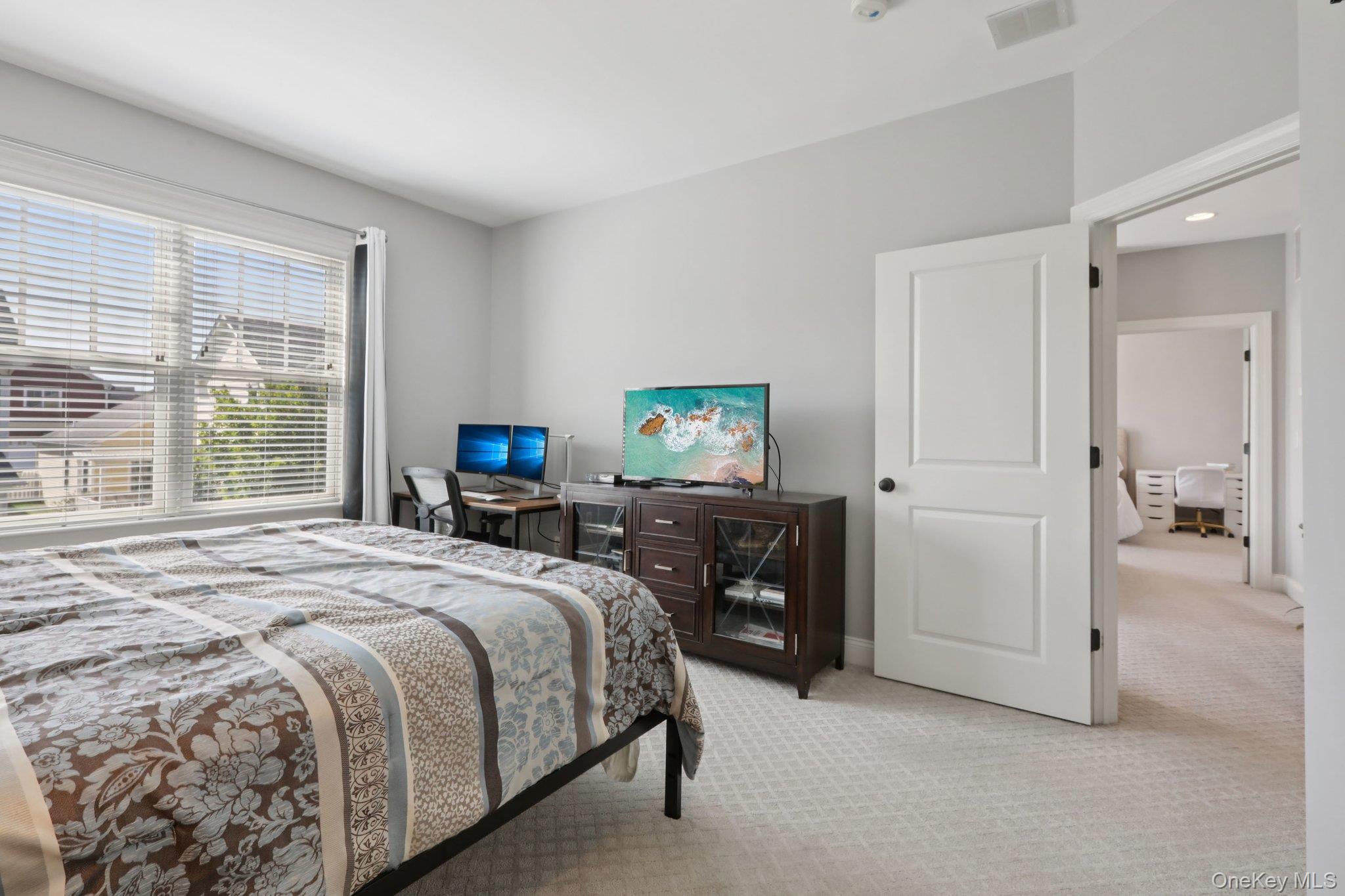 21 Long House Road Warwick, NY 10990 - Photo 31 of 50 a bedroom with a bed and a television