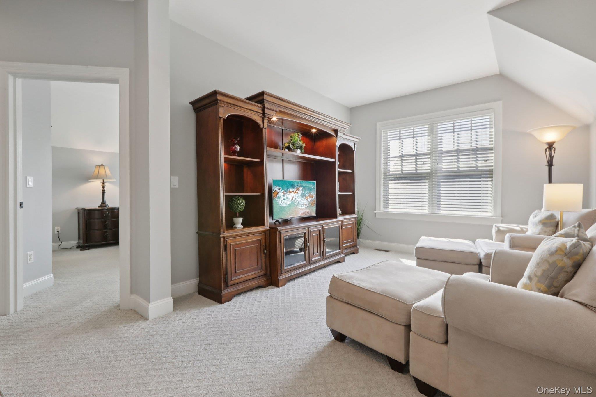 21 Long House Road Warwick, NY 10990 - Photo 33 of 50 a living room with furniture and a flat screen tv