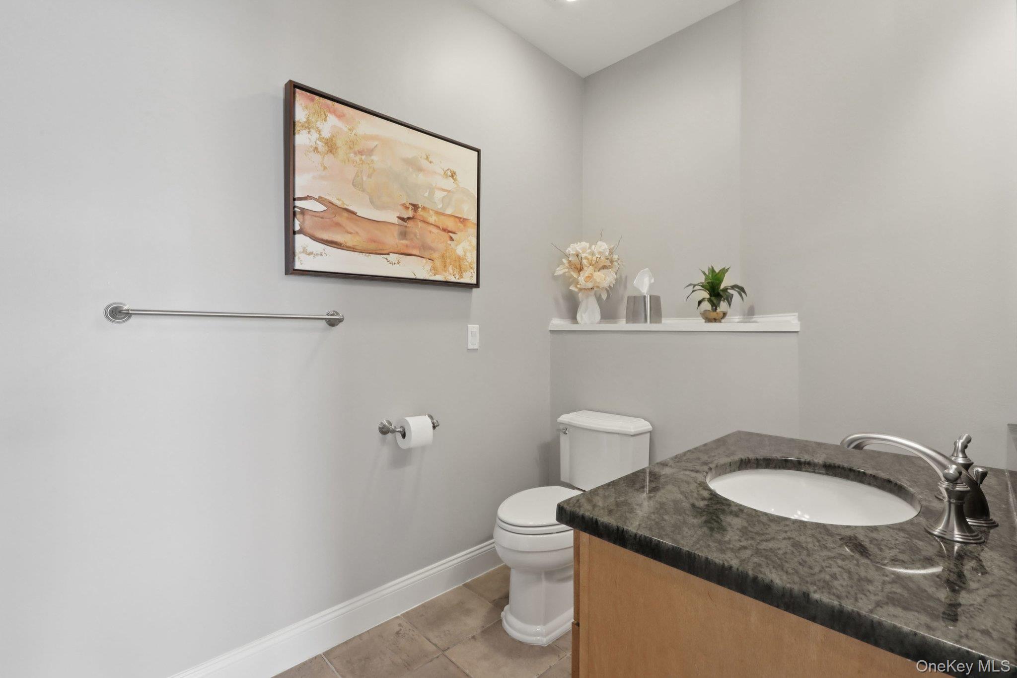 21 Long House Road Warwick, NY 10990 - Photo 34 of 50 a bathroom with a granite countertop sink a toilet and a mirror