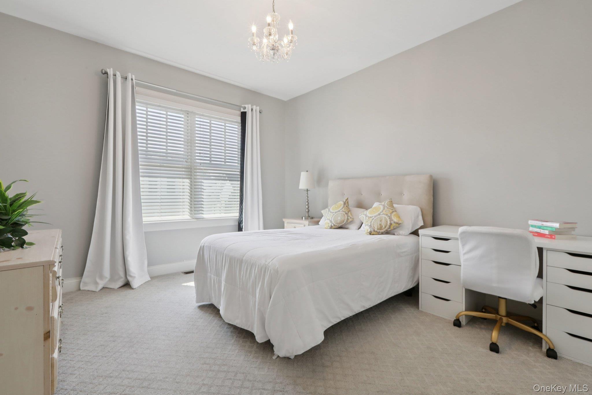 21 Long House Road Warwick, NY 10990 - Photo 36 of 50 a bedroom with a bed and a table chair