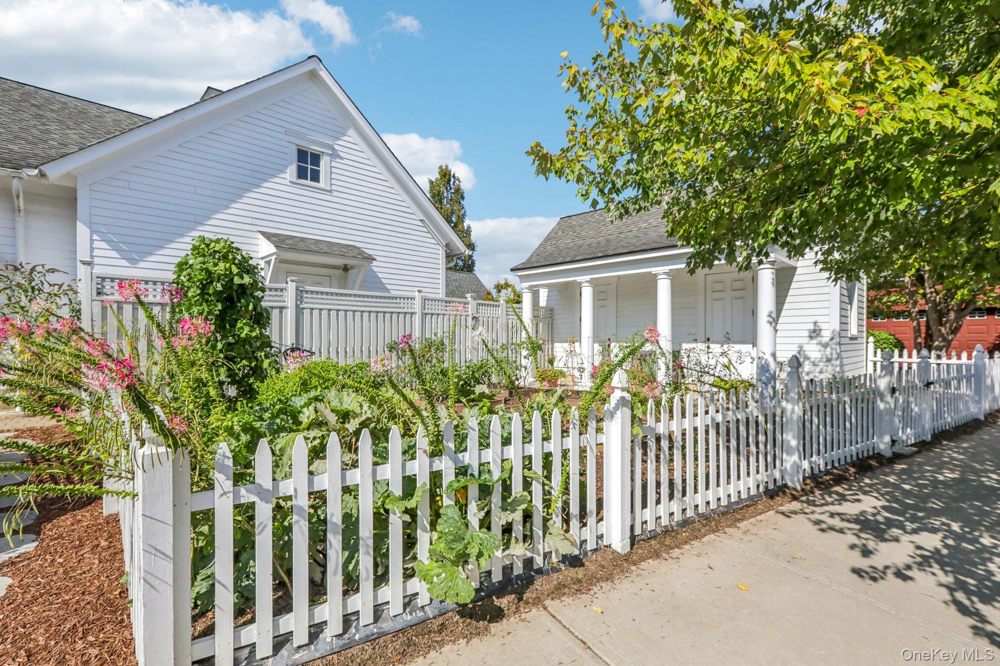 21 Long House Road Warwick, NY 10990 - Photo 48 of 50 a front view of a house with a garden