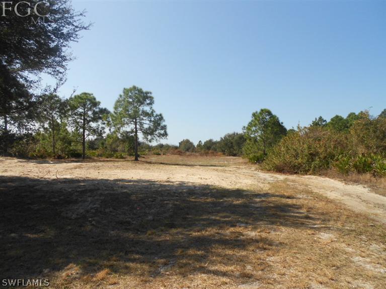 11660 Shawnee Road Fort Myers, FL 33913 - Photo 1 of 12 a view of lake with mountain