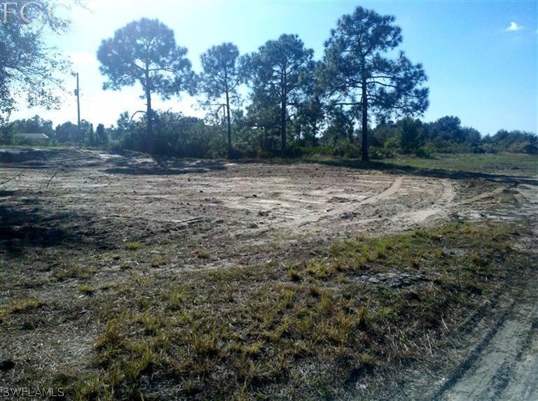 11660 Shawnee Road Fort Myers, FL 33913 - Photo 2 of 12 a view of lake with green space