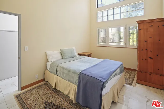 a view of a door and wooden floor