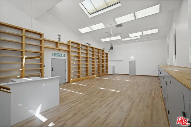 a view of a livingroom with wooden floor