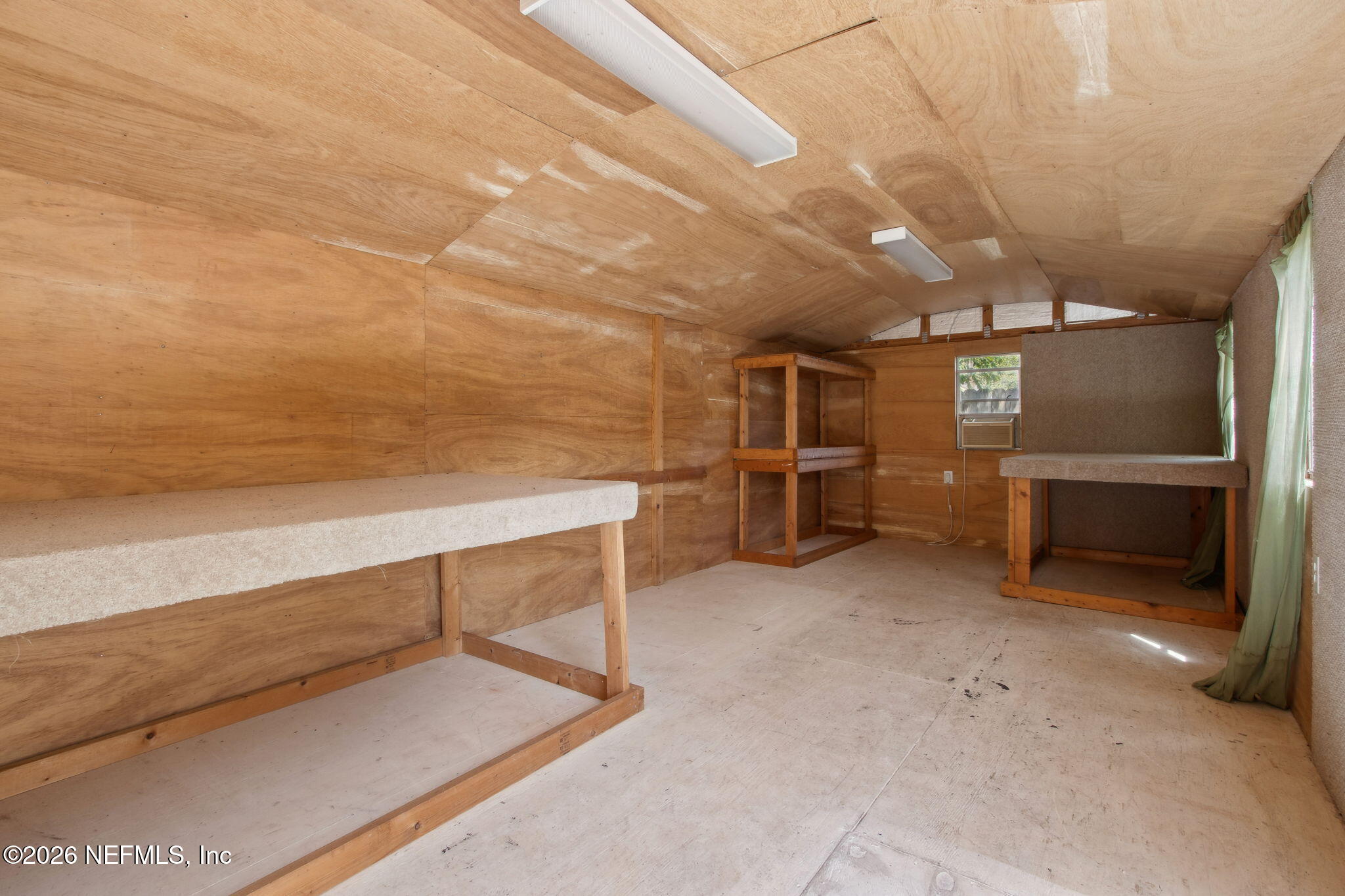 4649 Cambridge Road Jacksonville, FL 32210 - Photo 20 of 24 a view of an empty room with kitchen