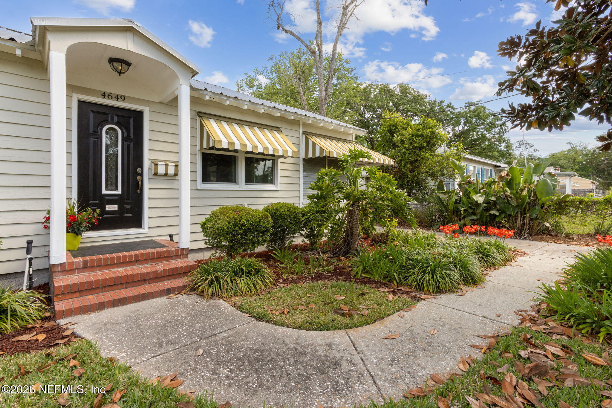 4649 Cambridge Road Jacksonville, FL 32210 - Photo 23 of 24 a view of a small house in front of a house