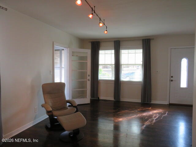 4649 Cambridge Road Jacksonville, FL 32210 - Photo 3 of 24 a living room with furniture and a window