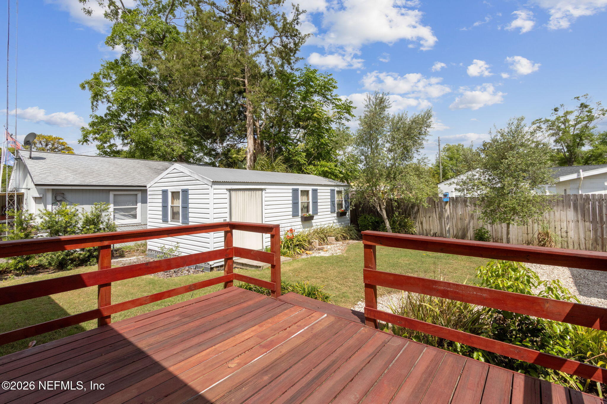 4649 Cambridge Road Jacksonville, FL 32210 - Photo 10 of 24 a view of a house with yard and sitting area
