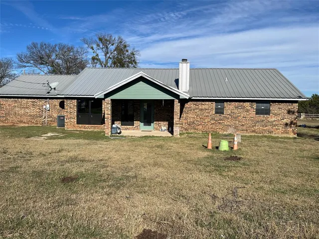 a front view of house with yard