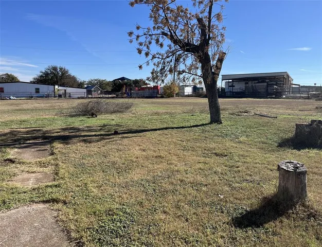 a view of a yard with an outdoor space