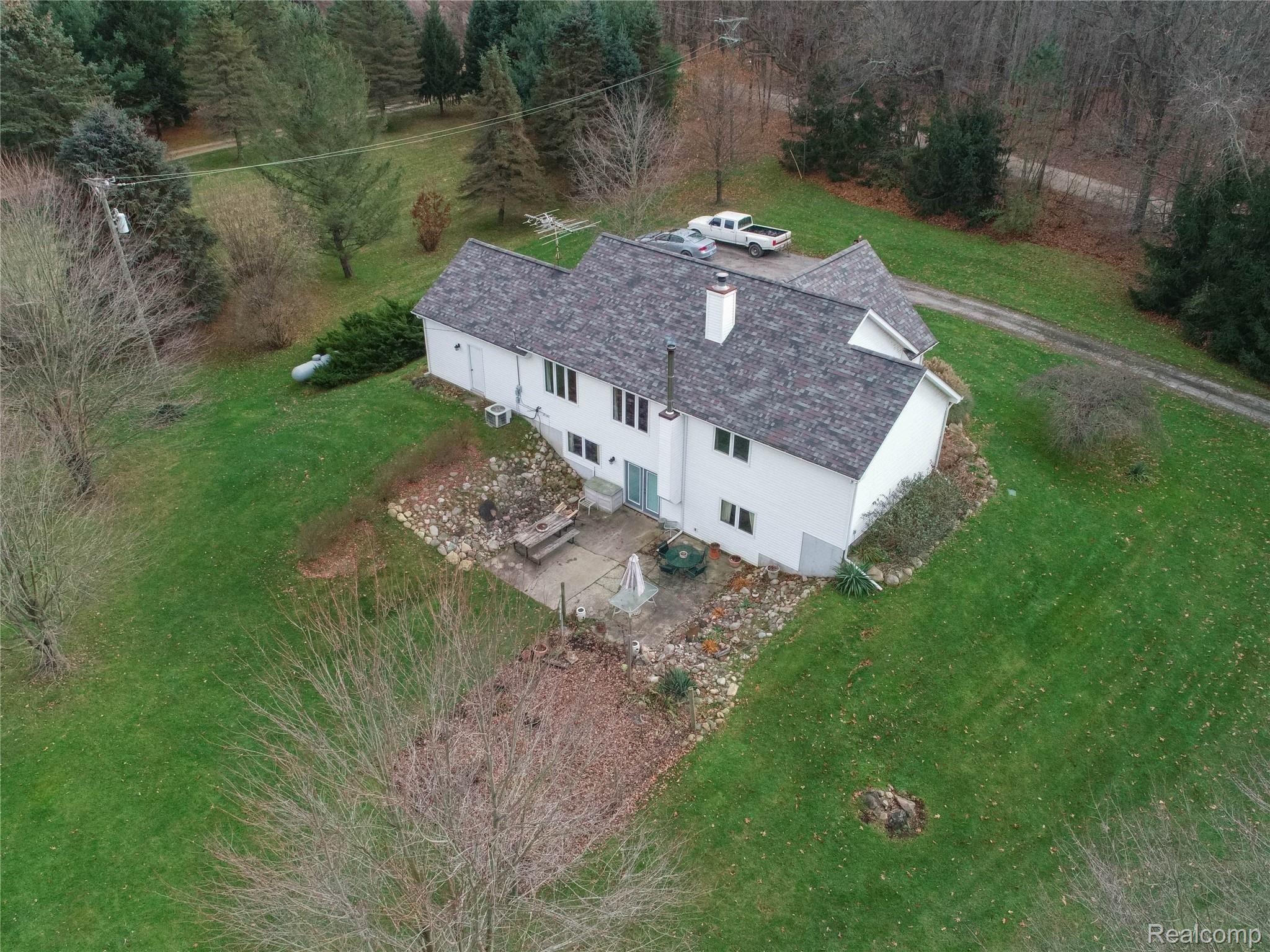 6996 Crofoot Road Fowlerville, MI 48836 - Photo 2 of 36 Finished Lower Level Has Walkout & Daylight Windows! New Roof!