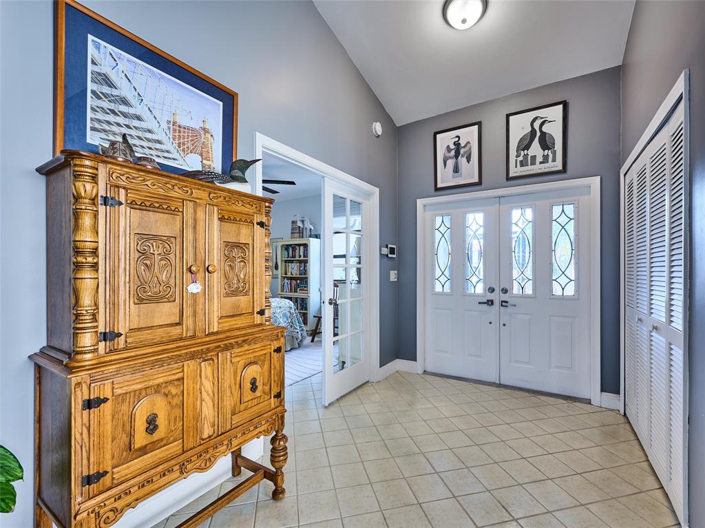 19284 Cherry Hills Terrace Boca Raton, FL 33498 - Photo 3 of 45 a view of a hallway with entryway door
