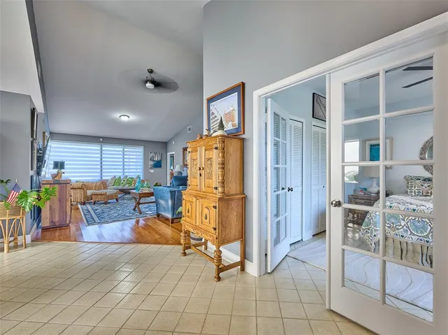 a view of a livingroom with furniture and a window