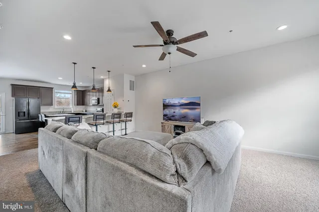 a bedroom with a bed and dresser