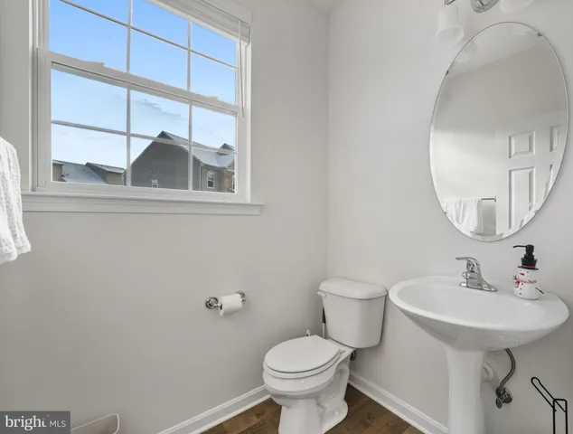 a bedroom with a bed and lamp