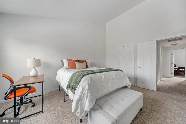 a bathroom with a double vanity sink mirror and shower