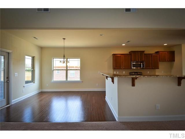 117 Weathers Street Rolesville, NC 27571 - Photo 6 of 16 Spacious breakfast room with large granite breakfast bar. Breakfast Area