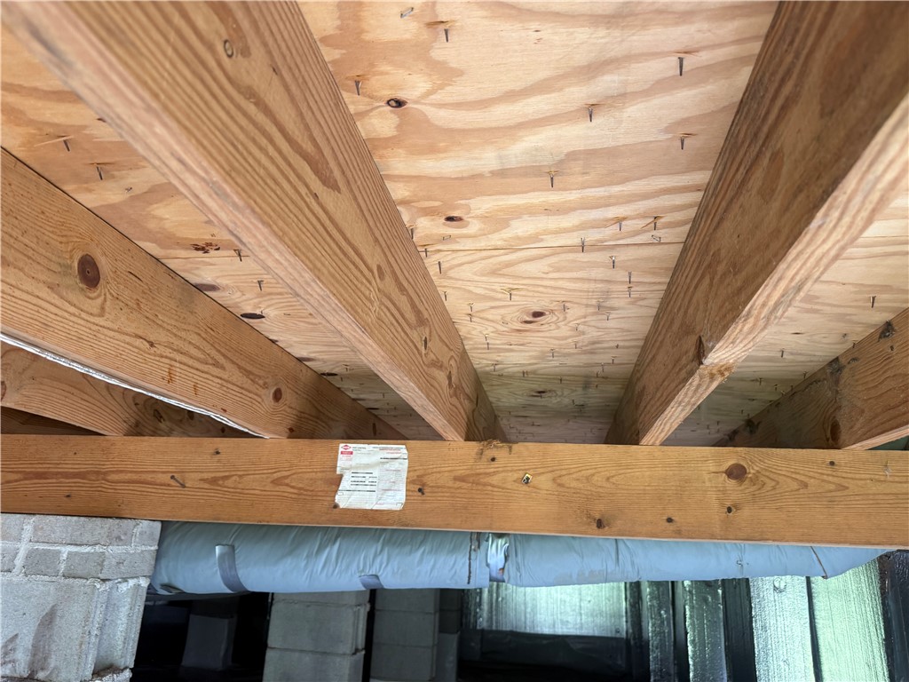 4027 Belhaven Road Belton, SC 29627 - Photo 23 of 24 Essential structural components, including floor joists and subflooring, provide a solid foundation.