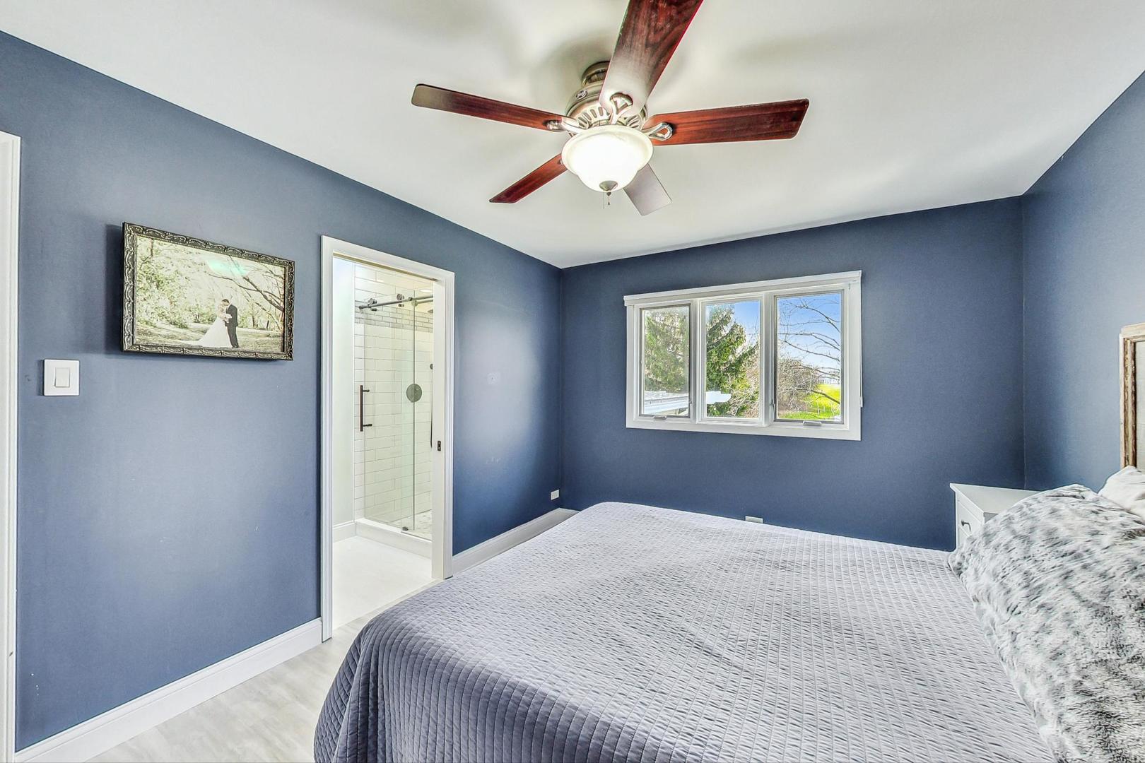 837 Foster Avenue Bartlett, IL 60103 - Photo 16 of 46 a bedroom with bed and window