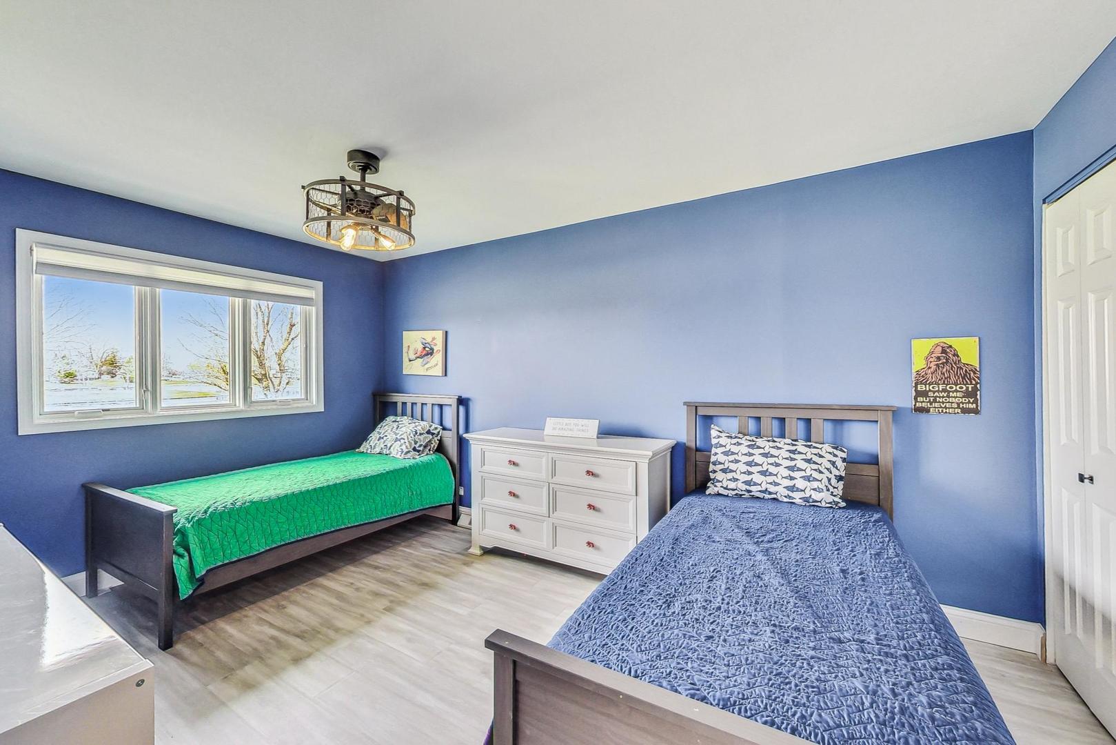 837 Foster Avenue Bartlett, IL 60103 - Photo 20 of 46 a bedroom with a bed and window