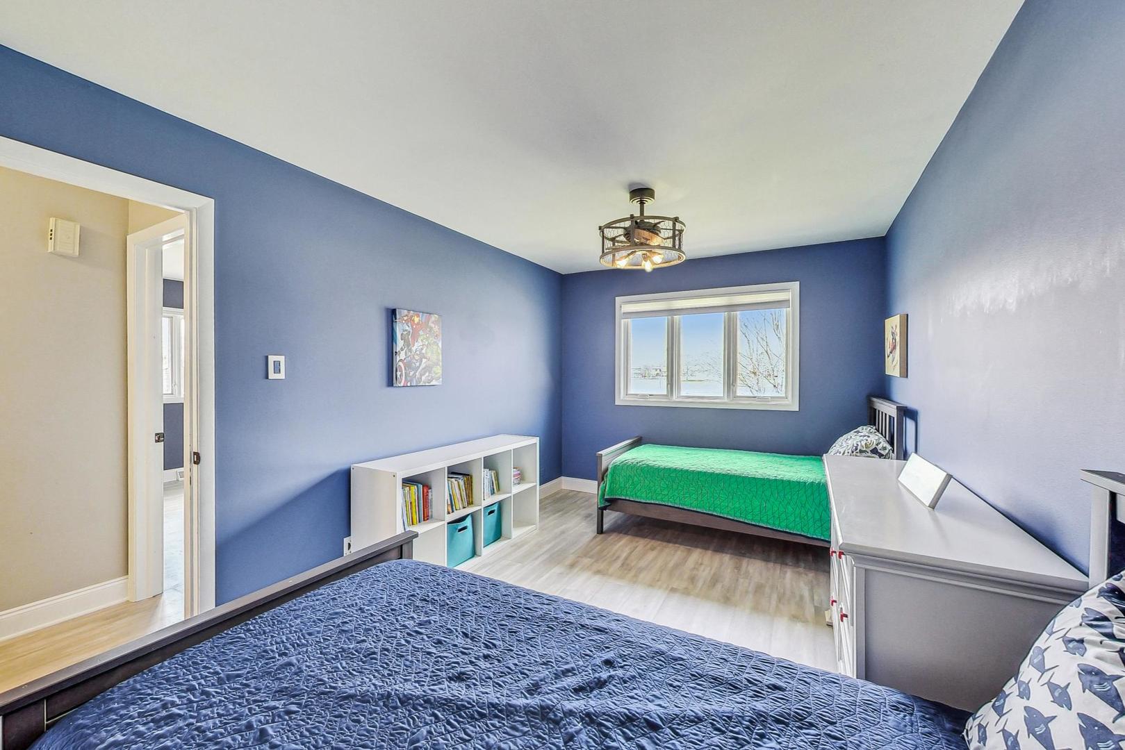 837 Foster Avenue Bartlett, IL 60103 - Photo 21 of 46 a living room with furniture and a window