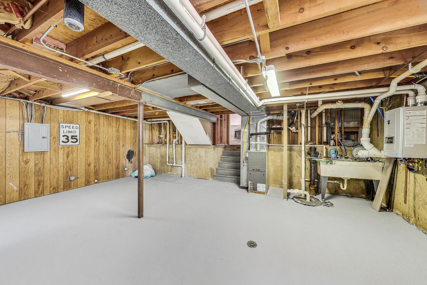 837 Foster Avenue Bartlett, IL 60103 - Photo 33 of 46 a view of an empty room with wooden roof