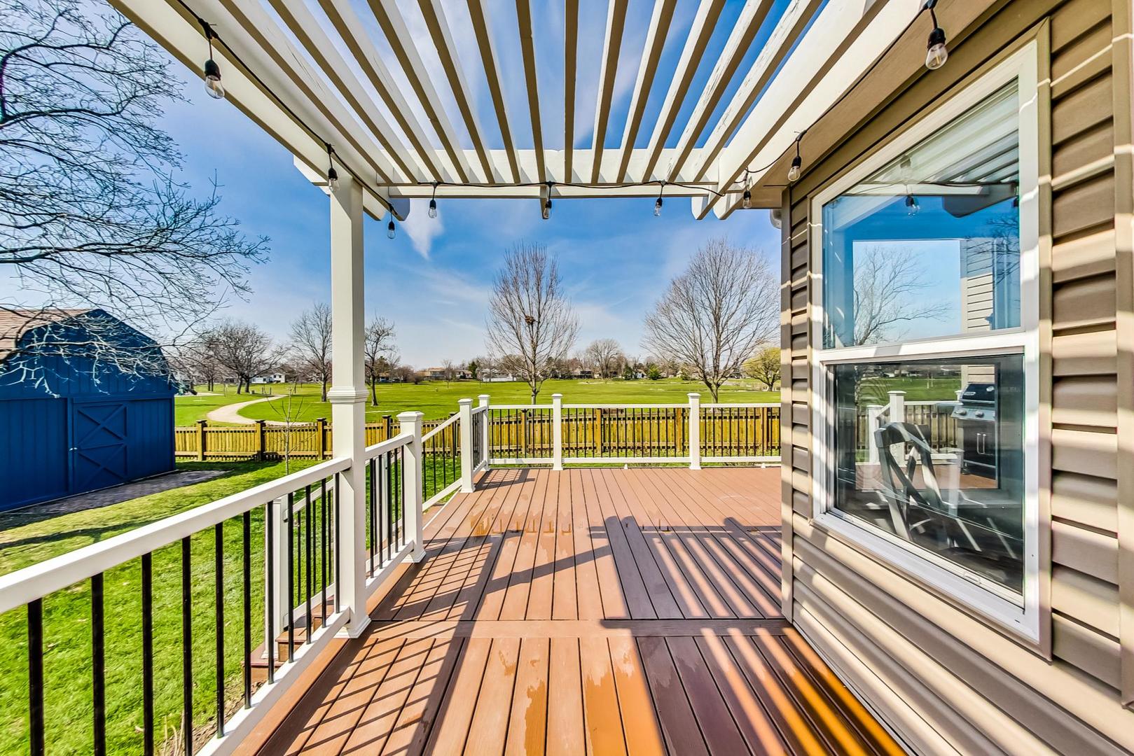 837 Foster Avenue Bartlett, IL 60103 - Photo 36 of 46 a view of a balcony with wooden floor