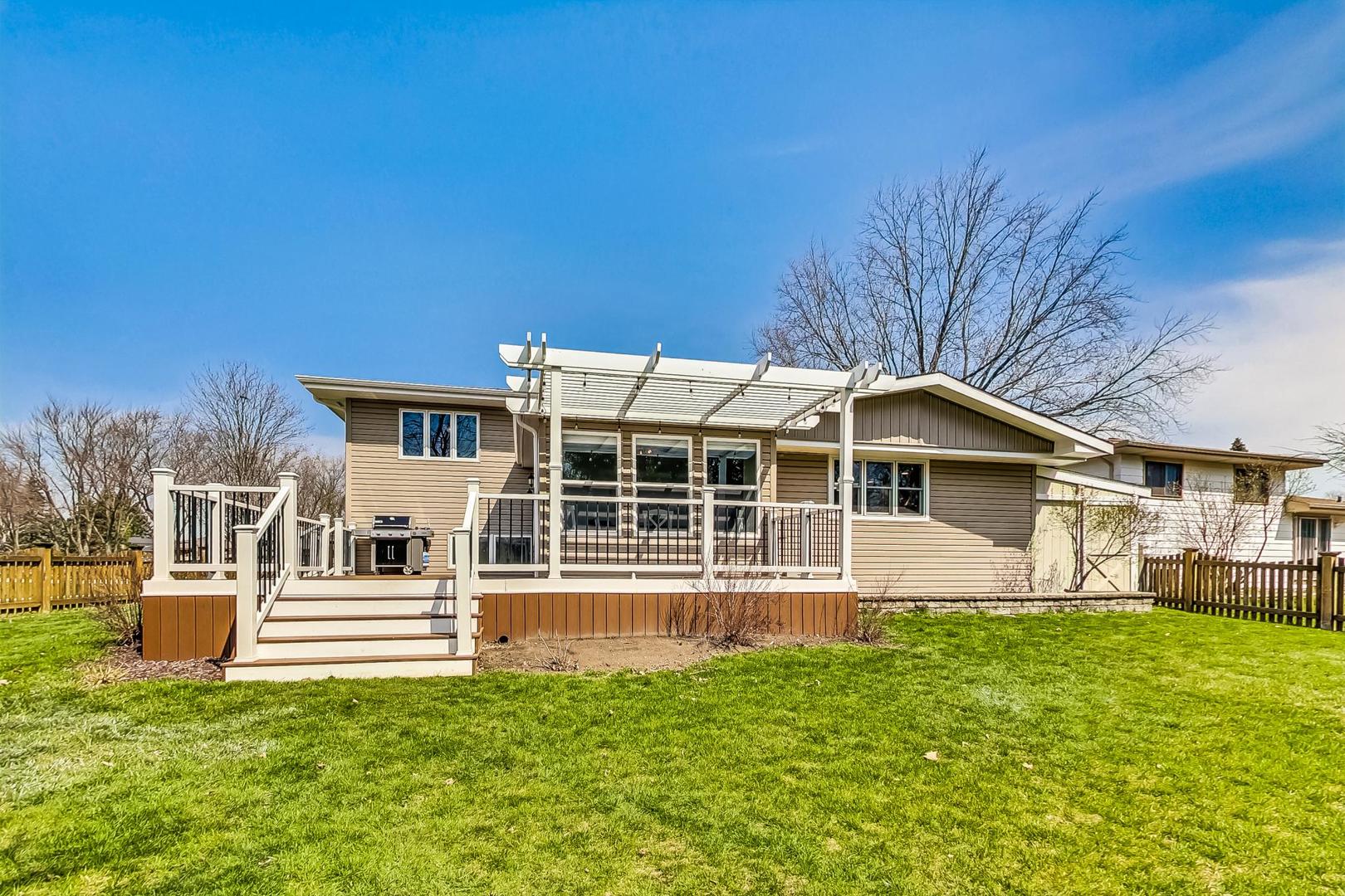 837 Foster Avenue Bartlett, IL 60103 - Photo 37 of 46 a house view with a garden space