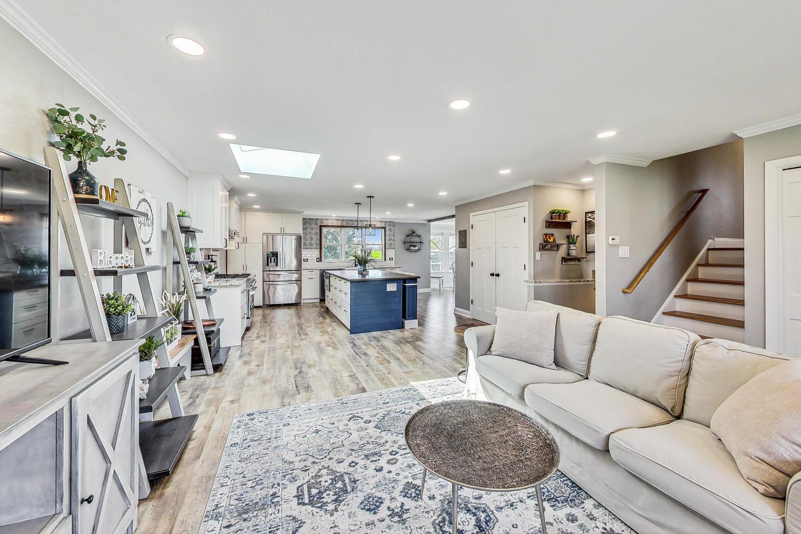 837 Foster Avenue Bartlett, IL 60103 - Photo 7 of 46 a living room with furniture and wooden floor
